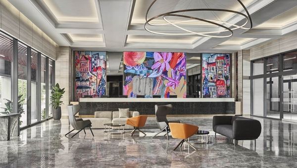 The hotel’s lobby features artwork by local artist Ripple Root, depicting Singapore’s iconic shophouses.